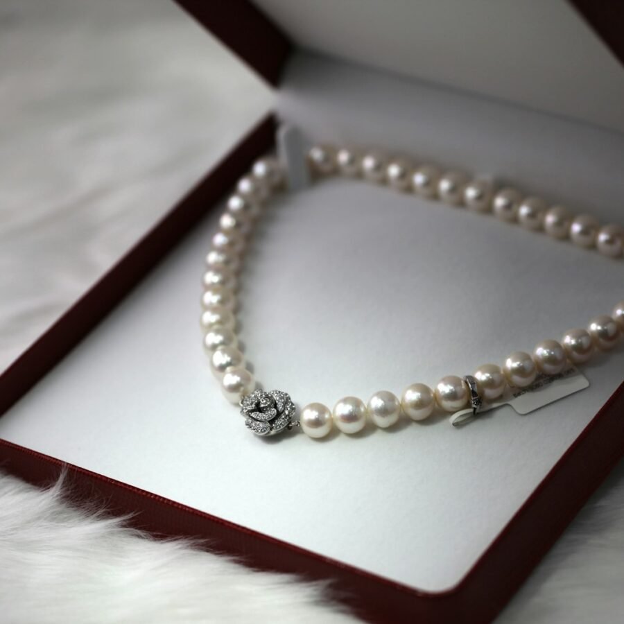 Gold jewelry arranged on a linen cloth