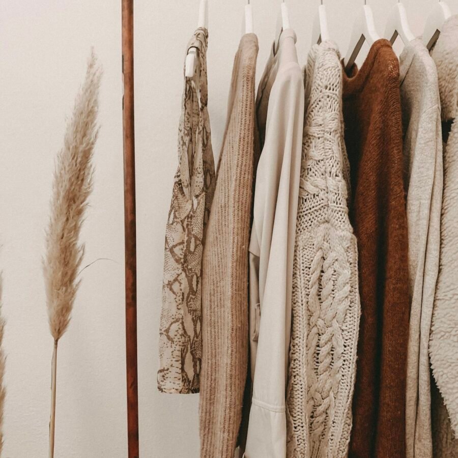 Clothing rack with earth-tone garments