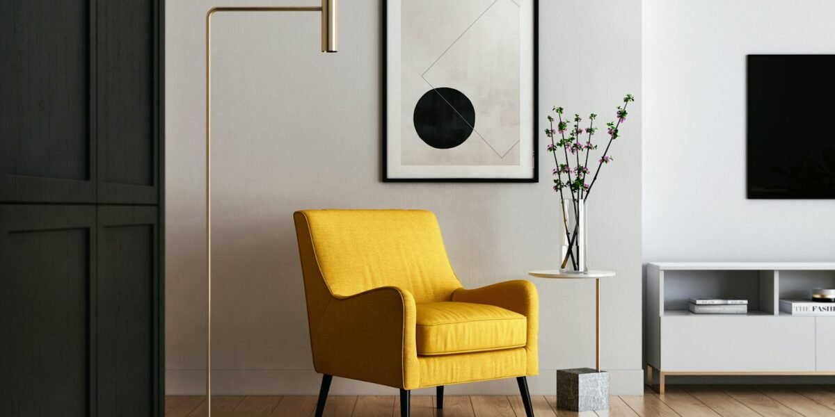 Styled corner of a modern apartment with chair and plants