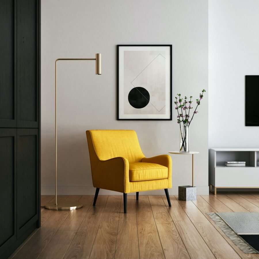 Styled corner of a modern apartment with chair and plants